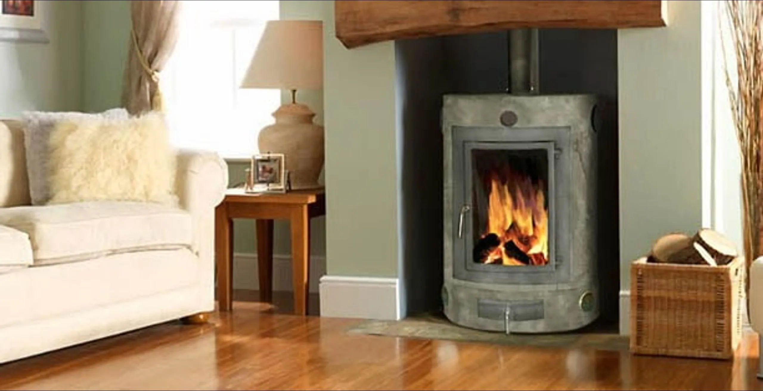 The Ecco Stove masonry heater alight in the living room at West Linton